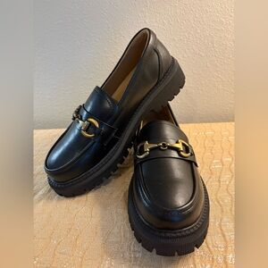 Black Women's Lug Sole Loafers with Gold Horsebit